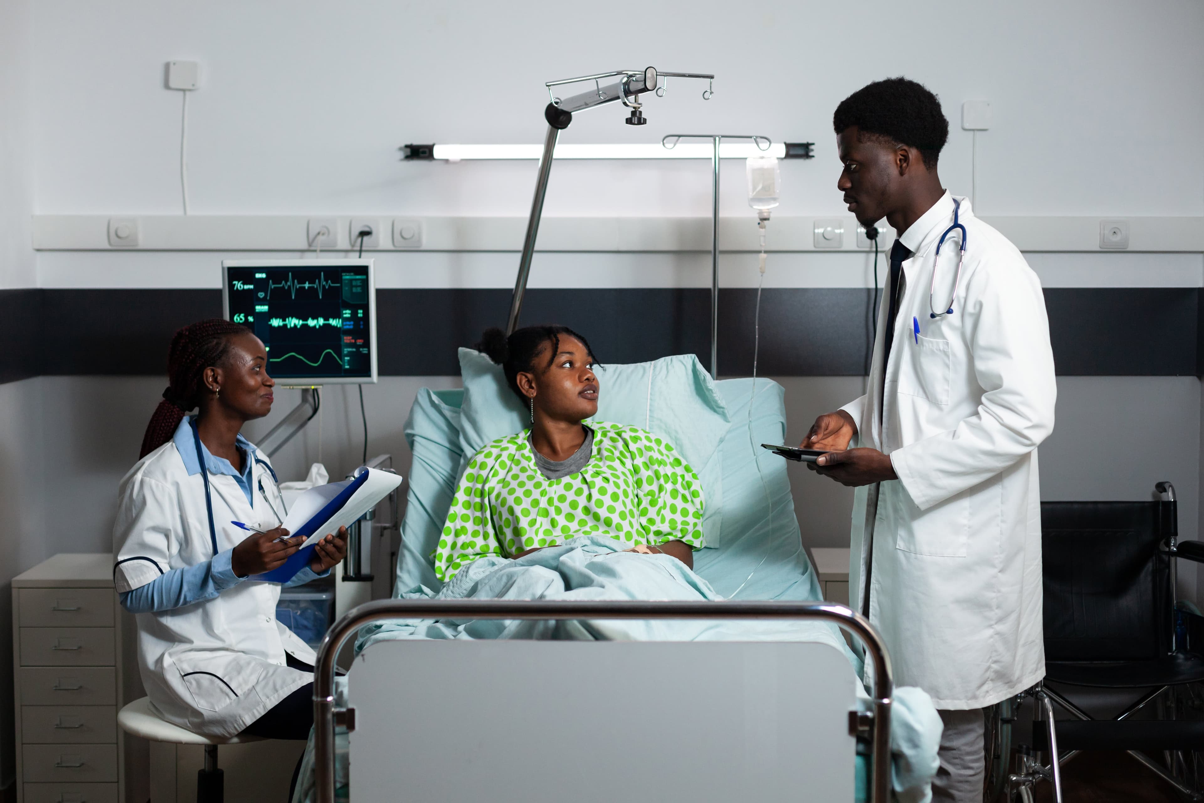 A healthcare provider consulting with a patient