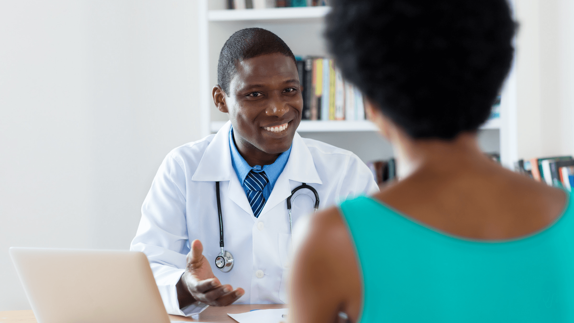 A VeriDoctor healthcare provider consulting with a patient
